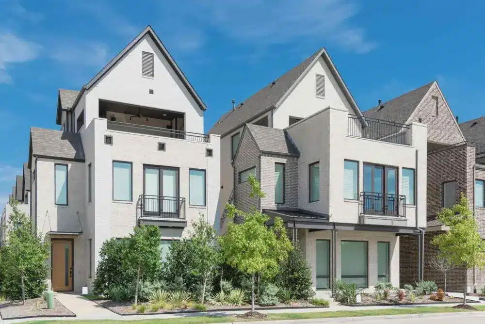 Close-up porch entrance of brand new row of three-story single-family houses in Richardson, North Dallas