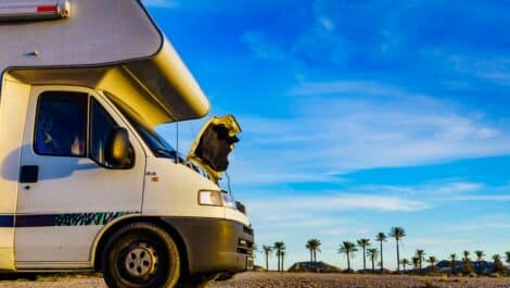 An RV getting engine Maintenance on the side of the road in Florida.