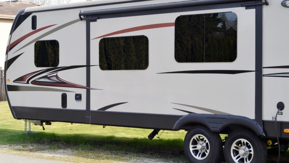 rv parked in a lot ready for dimension measurements