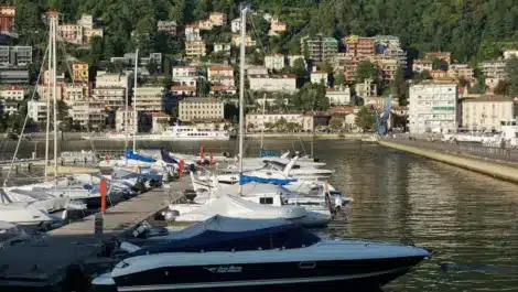 Boats stored next to a marina.