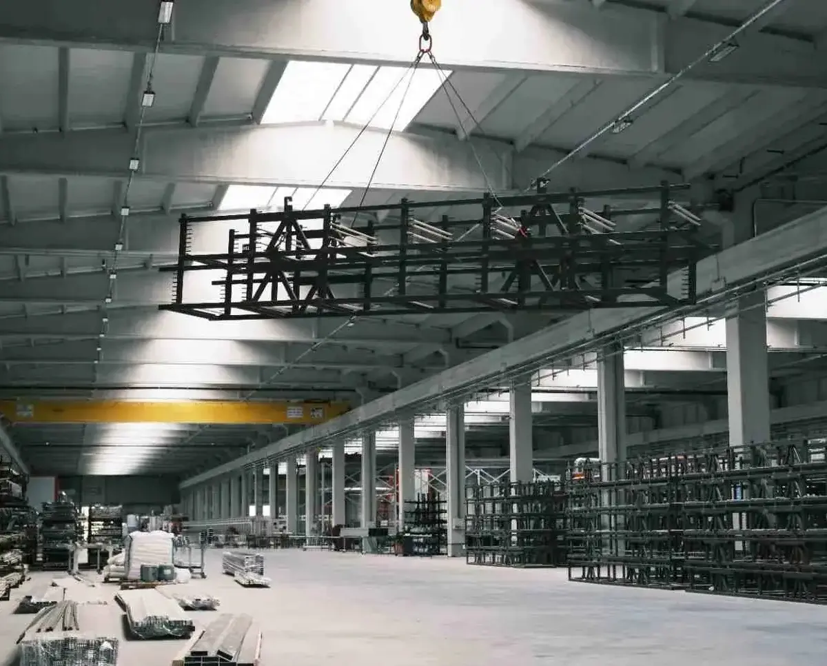 large industrial warehouse lifting steel frame