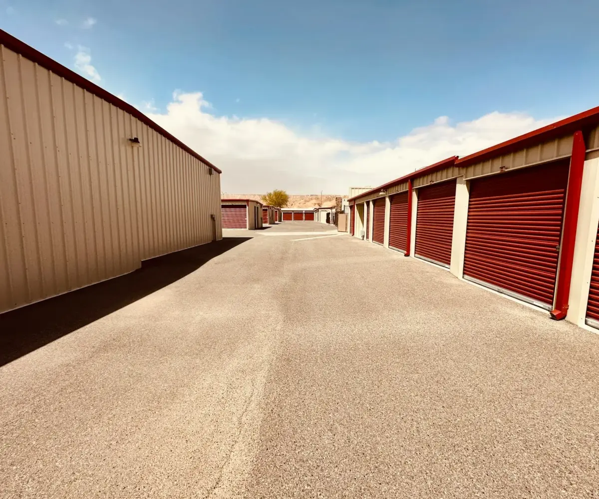 Self storage units with secure roll-up doors.