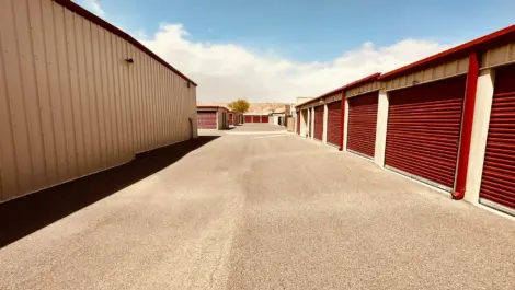 Self storage units with secure roll-up doors.