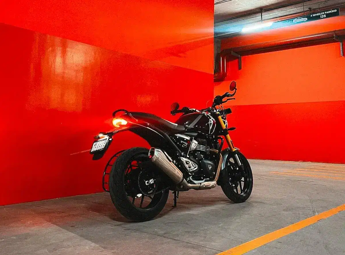 Motorcycle parked in a covered garage, illustrating a typical storage setting where proper documentation and ownership records are important.