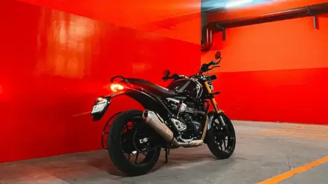 Motorcycle parked in a covered garage, illustrating a typical storage setting where proper documentation and ownership records are important.
